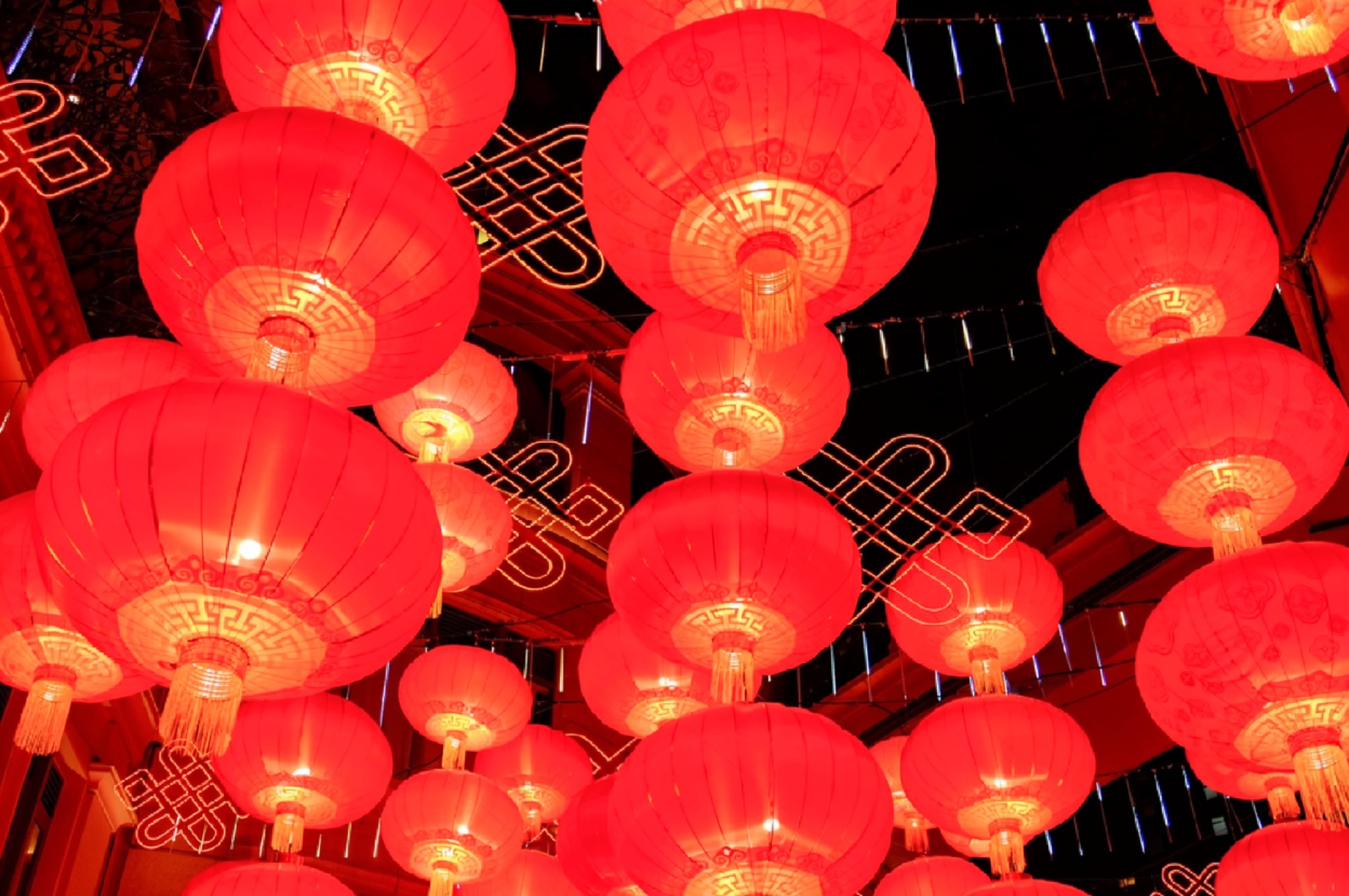 Traditional Chinese New Year decorations with red couplets and festive ornaments adorning a doorway