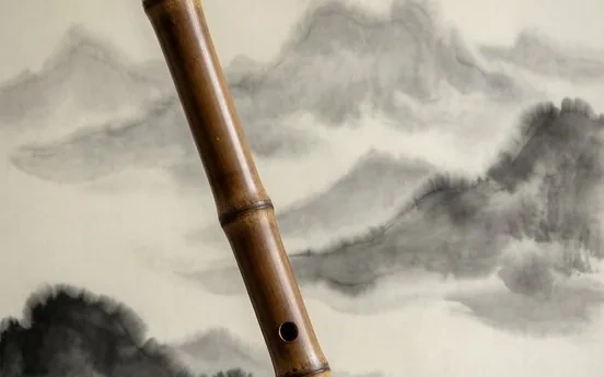 A vertical end-blown xiao flute of dark bamboo